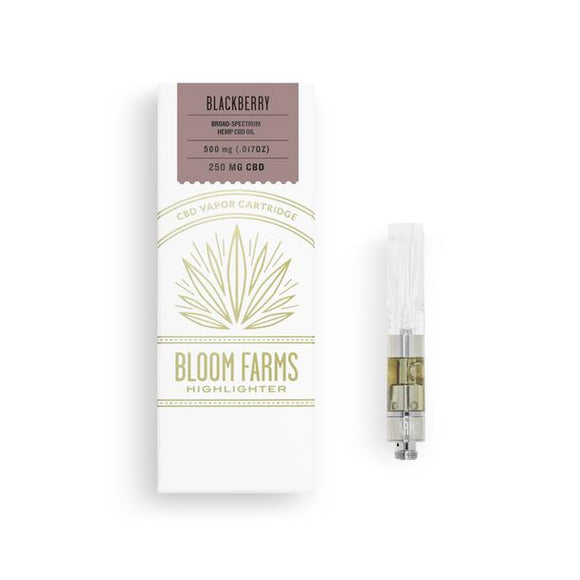 Picture of BLOOM FARMS BLACKBERRY CBD Vapor Cartridge next to packaging box. The box shows the flavor as BLACKBERRY.