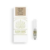 Picture of BLOOM FARMS STONE FRUIT CBD Vapor Cartridge next to packaging box. The box shows the flavor as STONE FRUIT.