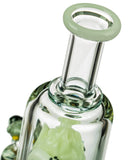 Close up view of the mouthpiece of the Empire Glassworks Avenge the Arctic UV Glass Attachment for Puffco Peak.