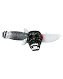 Side view of Empire Glassworks "Smoke & Dagger" Skull Hand Pipe, showing disturbing skull with a dagger through its head. The pipe is displayed on a white background.