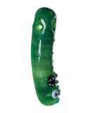 Side view of Empire Glassworks Pickle Rick Spoon Pipe, which is a green pipe with glass bumps to represent a pickle. There is also a Rick face on the mouthpiece end of pipe. The pipe is displayed on a white background.